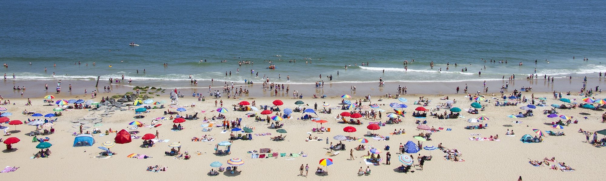 beaches of ocean city md crowded with people 